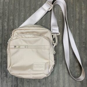 Calpak Stevyn Crossbody Bag White Medium Sized Water Resistant